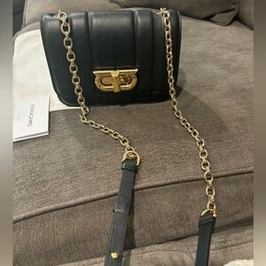 NWT Ferragamo Gacini Leather Mini Bag. Reasonable offers will be accepted.